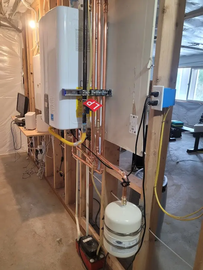 Licensed plumber repairing a kitchen sink in Chena Ridge